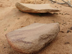Broken Grinding Stone used to grind and crush different materials either for food preparation or ochre pigments for ceremonies. Much like the pestle and mortar you use in a kitchen today.