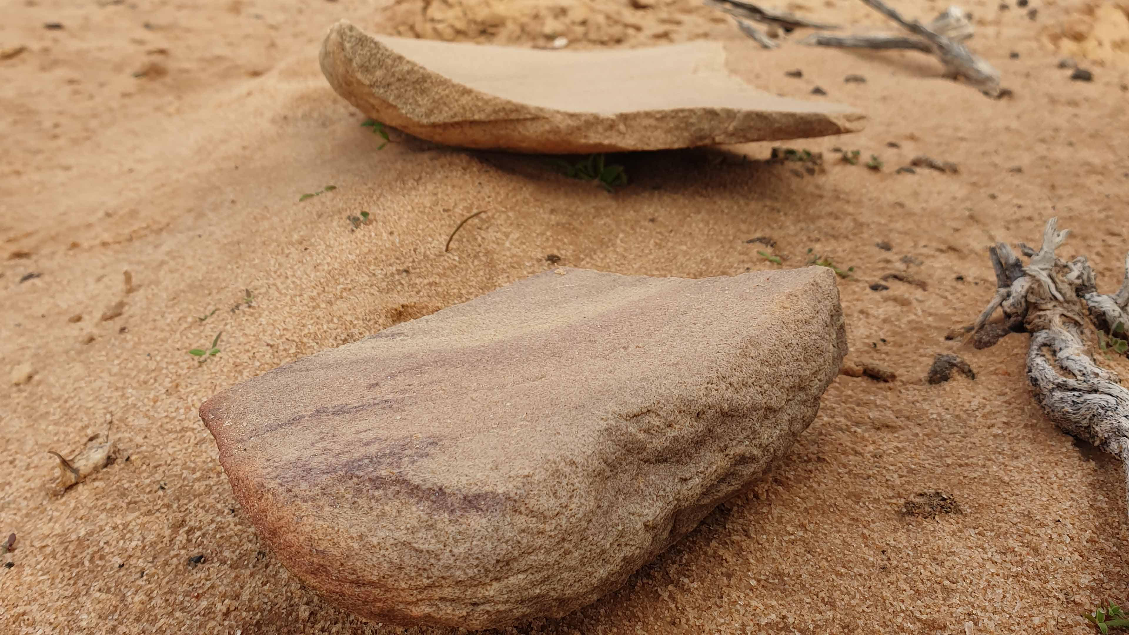 Broken Grinding Stone used to grind and crush different materials either for food preparation or ochre pigments for ceremonies. Much like the pestle and mortar you use in a kitchen today.