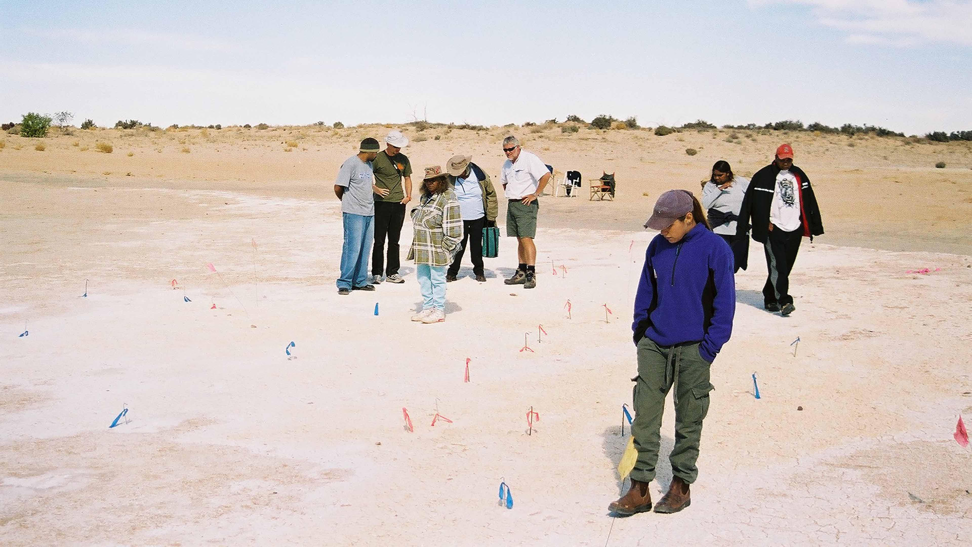 Inspecting the footprint site (Image from NPWS) 