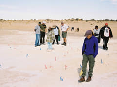 Inspecting the footprint site (Image from NPWS)