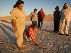 Elders from the 3 Tribal Groups at the footprint site (Image Courtesy Michael Amendolia)